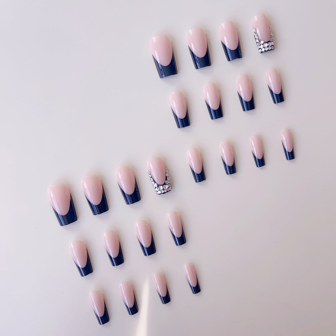 Artificial nail set with luxurious French design and sparkling rhinestone decorations Stornfield