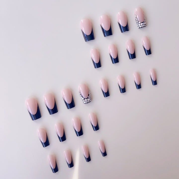 Artificial nail set with luxurious French design and sparkling rhinestone decorations Stornfield
