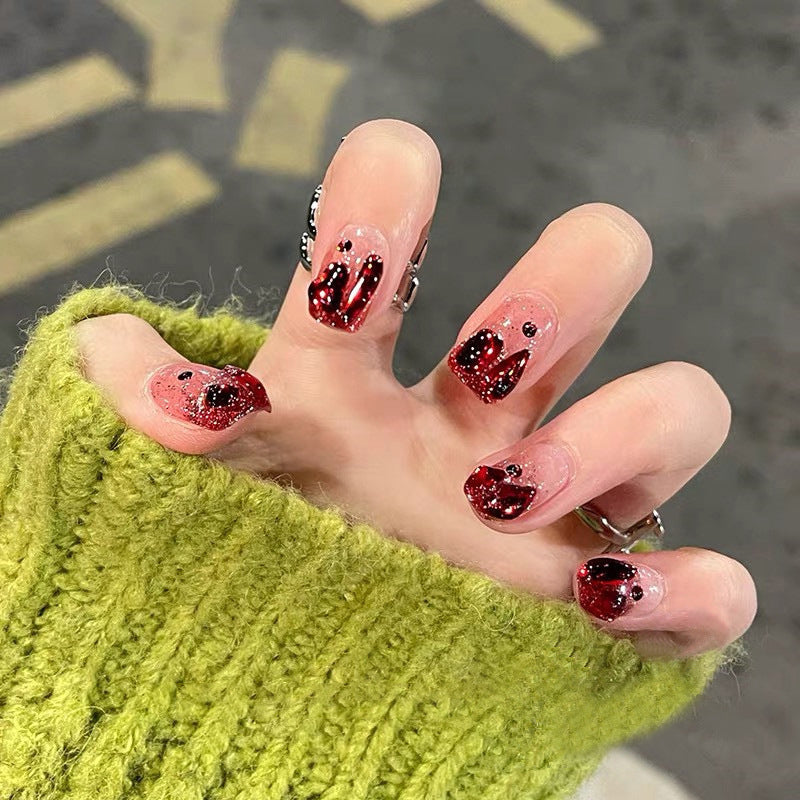 Glamorous artificial nails with sparkling accents Stornfield