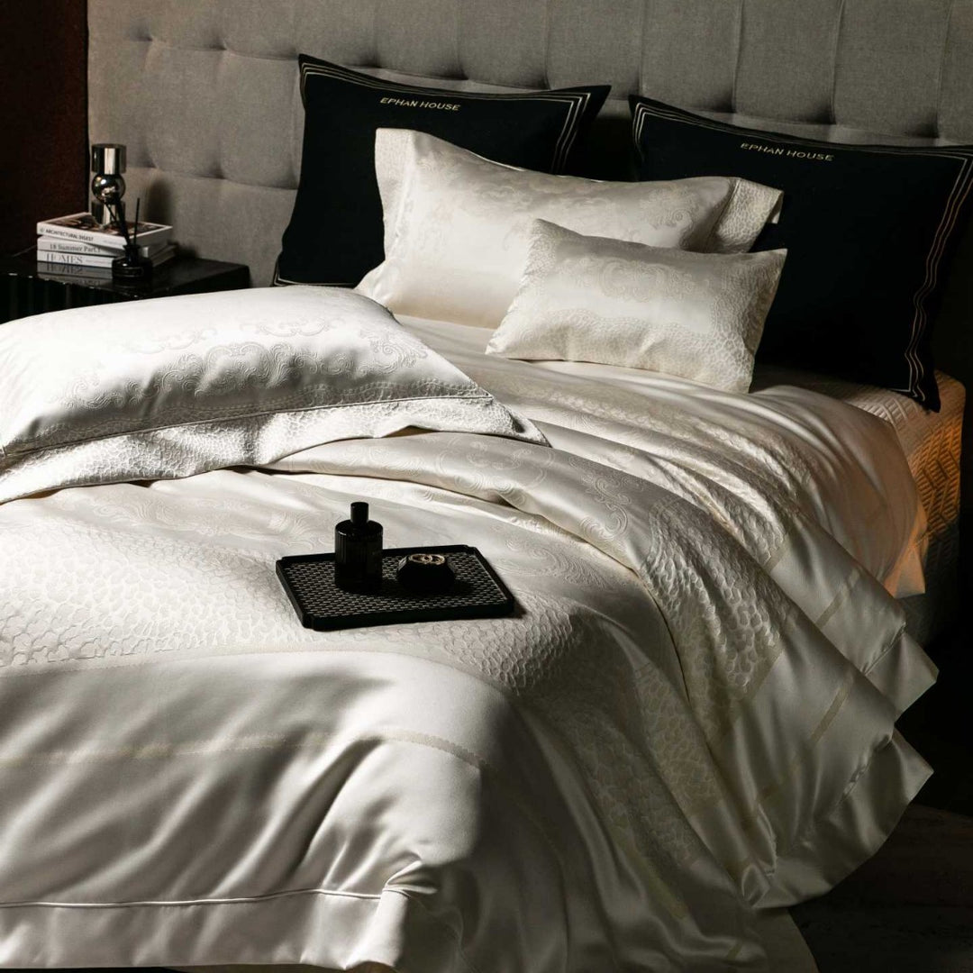 Jacquard bedding set made of cotton satin with embossed medallion and pillow ruffle