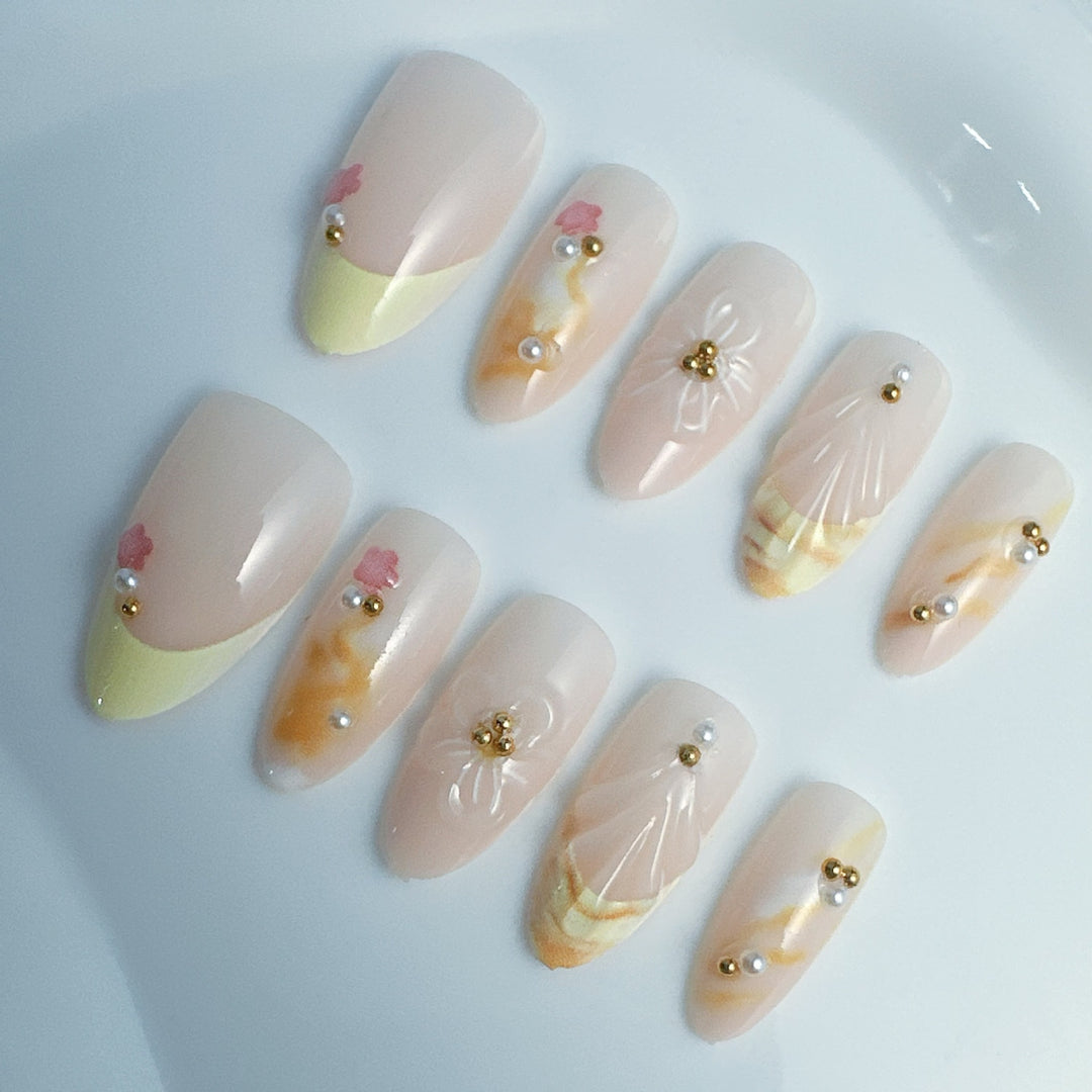 Artificial nails with floral and modern accents Stornfield