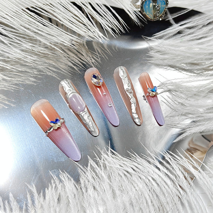 Artificial nails with elegant ombre design and jewelry accents Stornfield