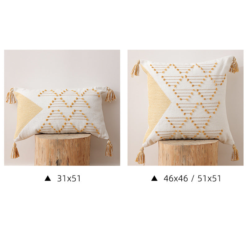 Decorative woven cushion cover with geometric tuft-relief and tassels Stornfield
