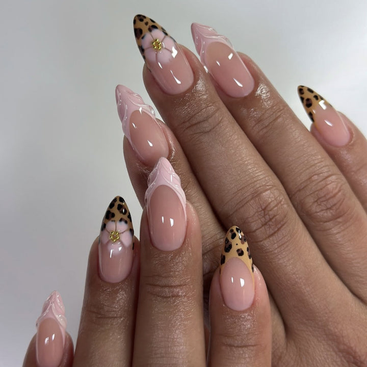 Artful stiletto nails with floral leopard pattern Stornfield