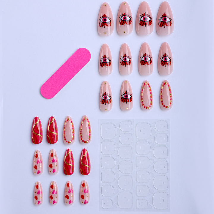 Creative heart and eye designs artificial nails Stornfield