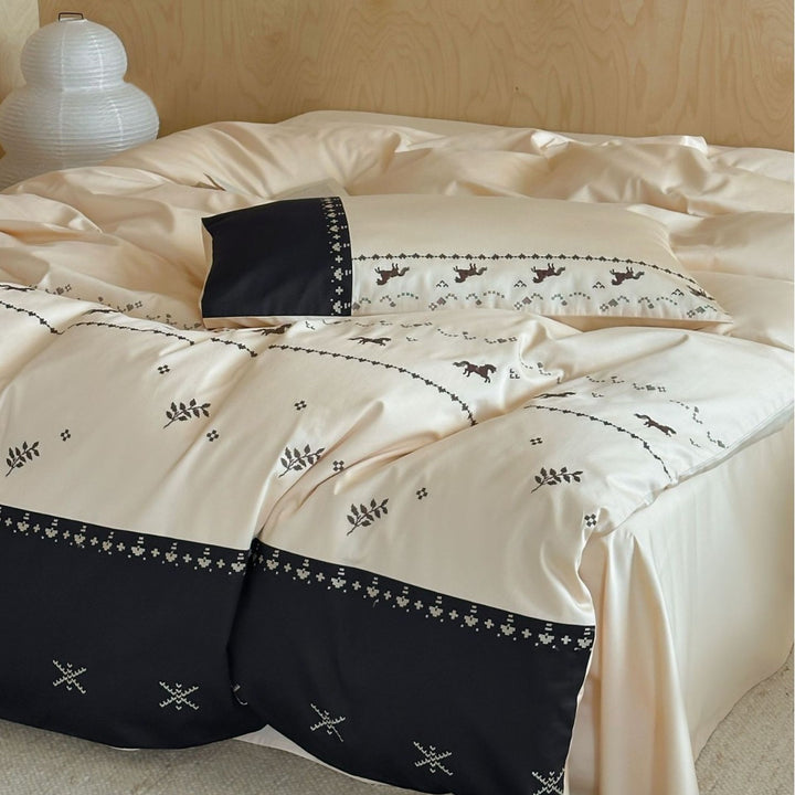 Satin bedding set with embroidered horse and leaf border