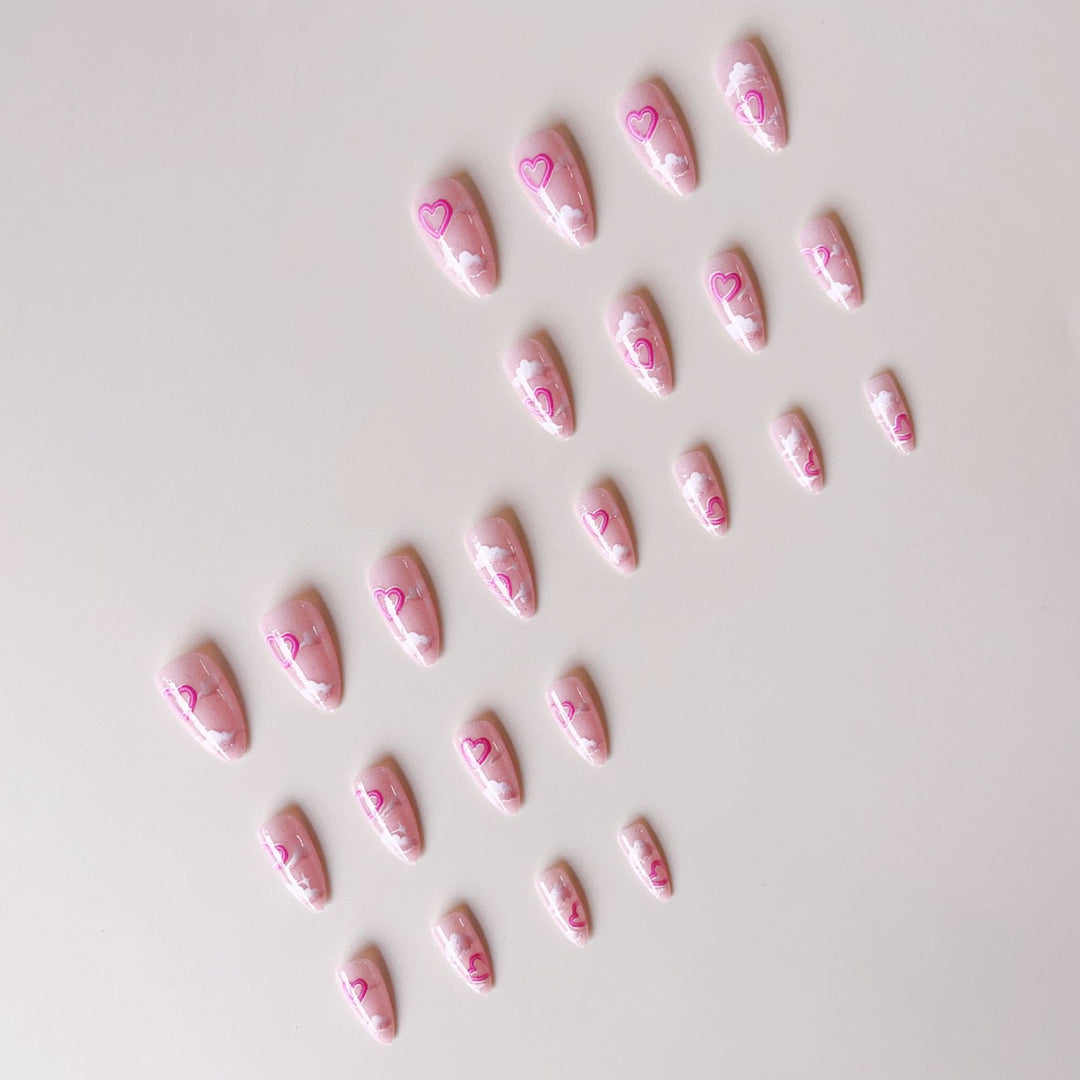 Artificial nail set with romantic heart accents and sparkling finish Stornfield