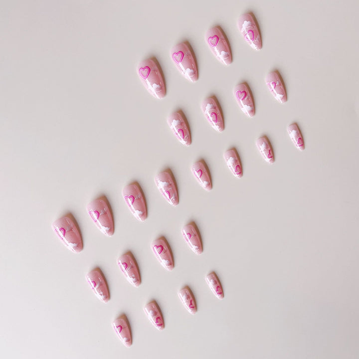 Artificial nail set with romantic heart accents and sparkling finish Stornfield