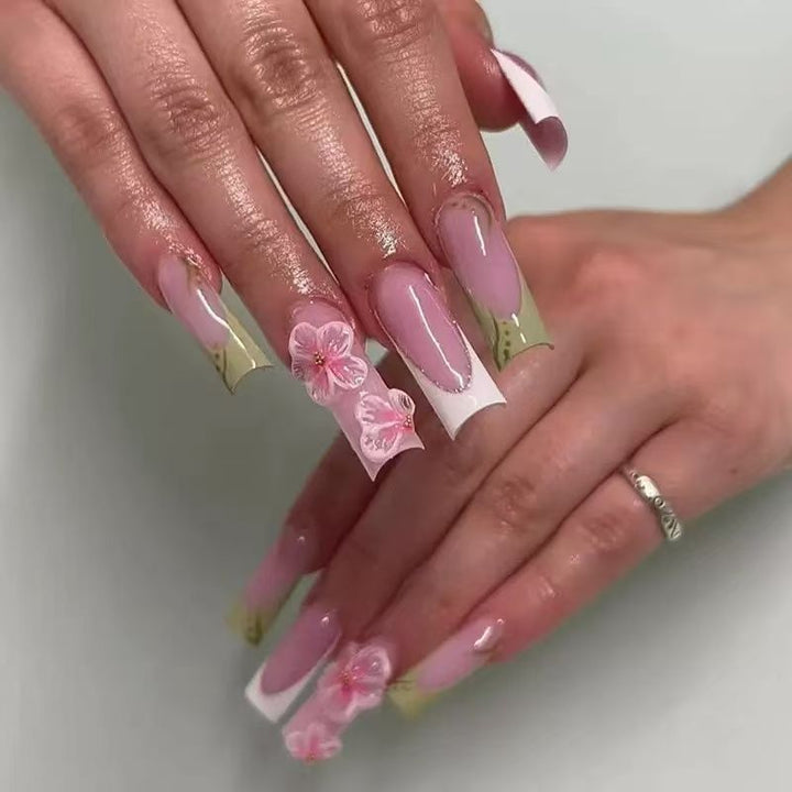 Artful nail tips with floral embellishments Stornfield