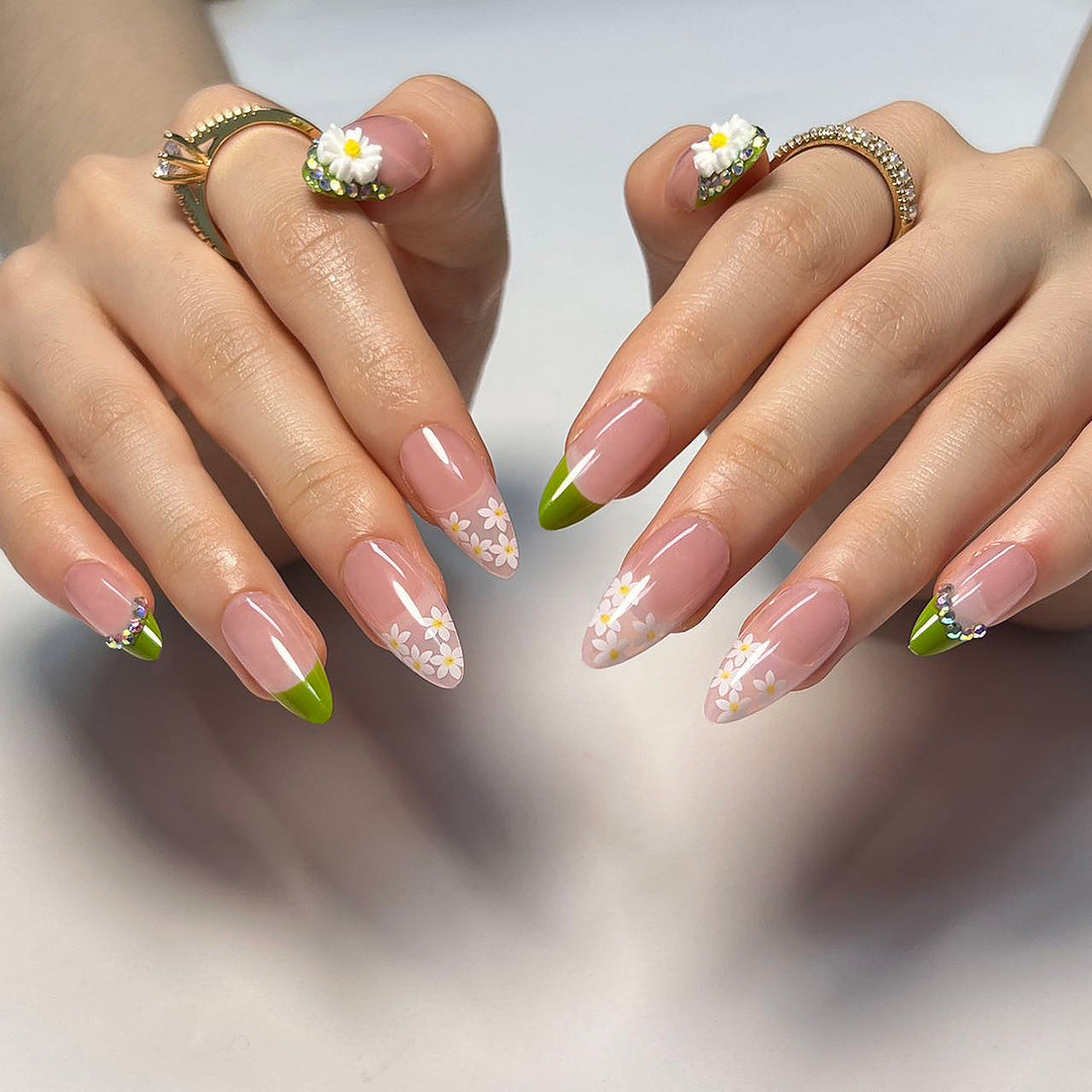 Artificial nails with floral accents and green French tip Stornfield