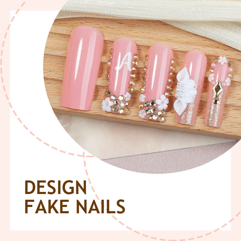 Creative acrylic nail set with delicate flower and gloss embellishments Stornfield