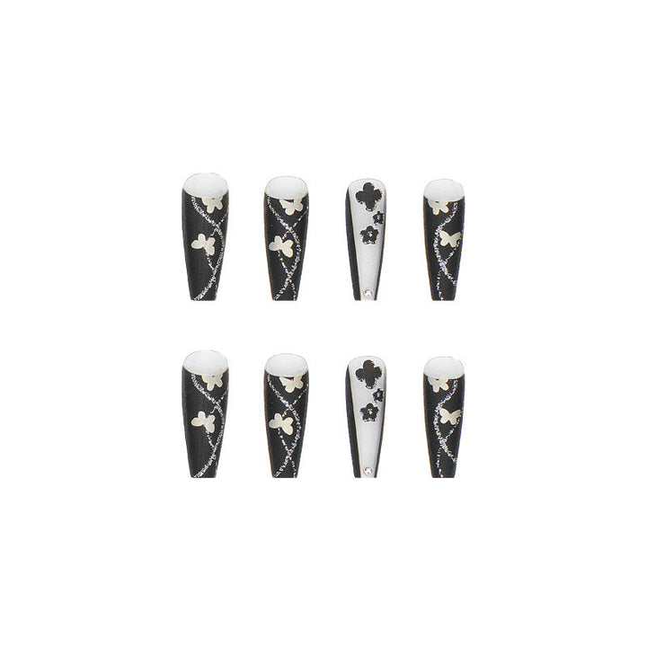 Art nail set with elegant butterfly and flower motifs Stornfield