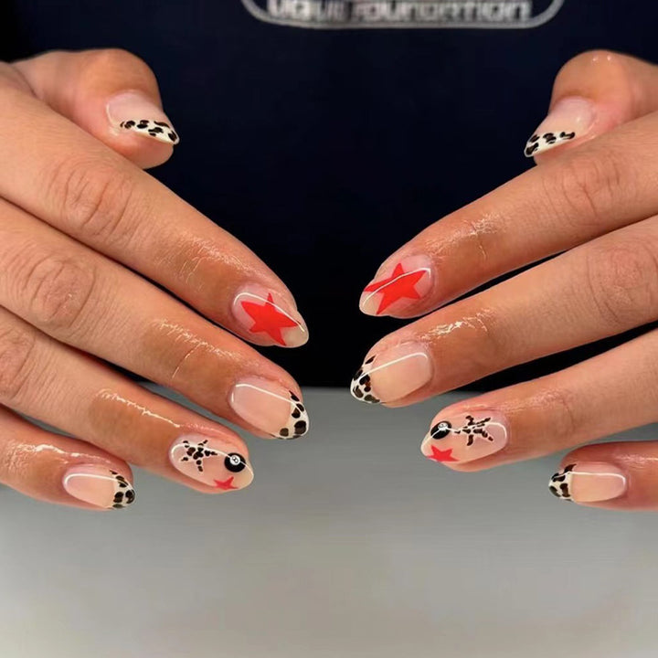 Artificial nail set with playful animal and star designs Stornfield