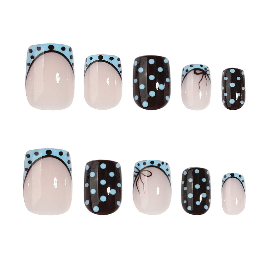 Artful nail extensions with playful dots and elegant design Stornfield