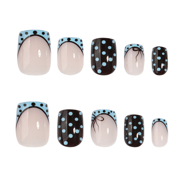 Artful nail extensions with playful dots and elegant design Stornfield