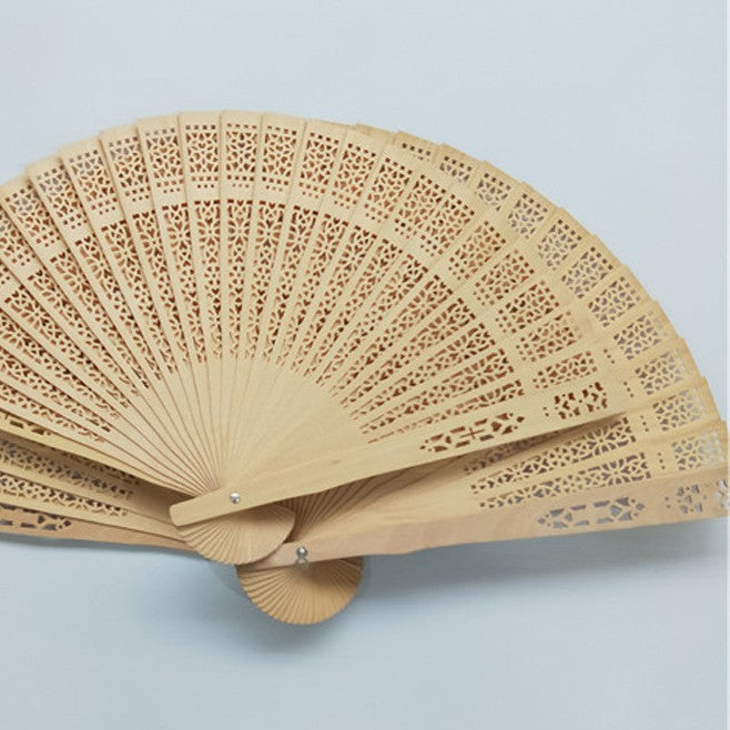 Ladies decorative and high-quality hand fan made of filigree wood Stornfield