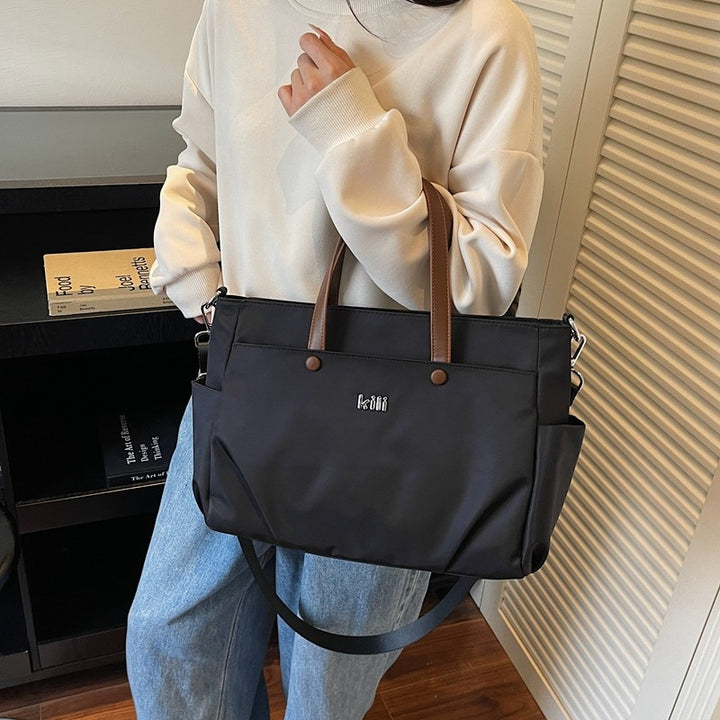 Shopping bag with comfortable carrying system and practical outer pockets Stornfield