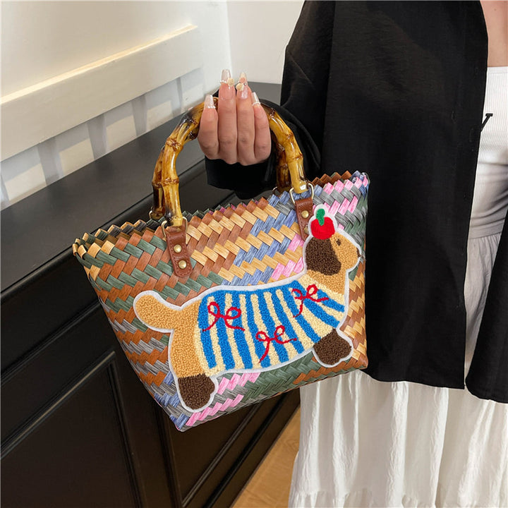 Shoulder bag with playful dog motif Stornfield