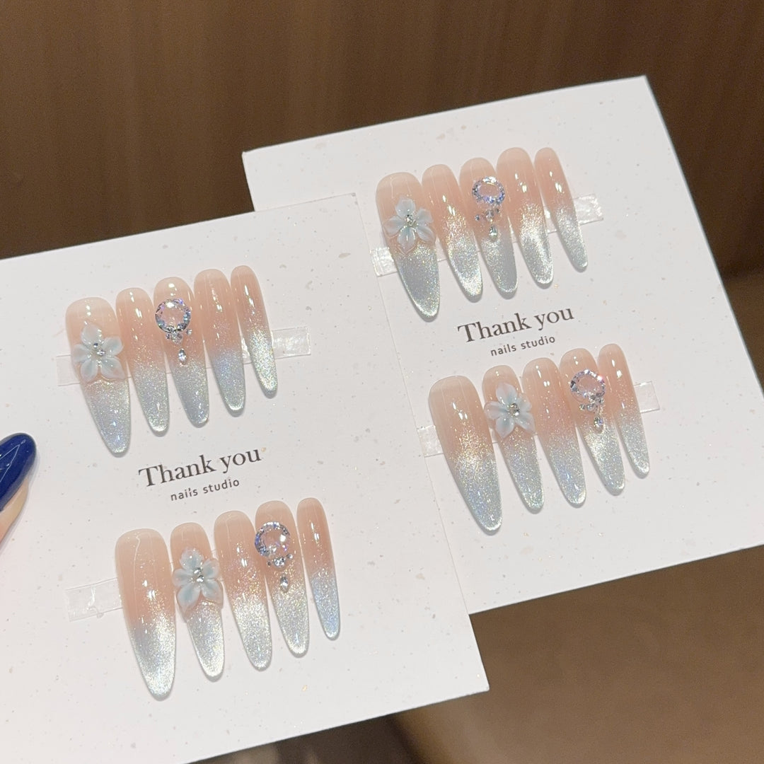 Artificial Nails Set with Shimmering Ombre Effect and Floral Accents Stornfield