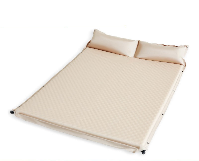 outdoor foldable camping and picnic mat with inflatable cushioned edge and waterproof base Stornfield