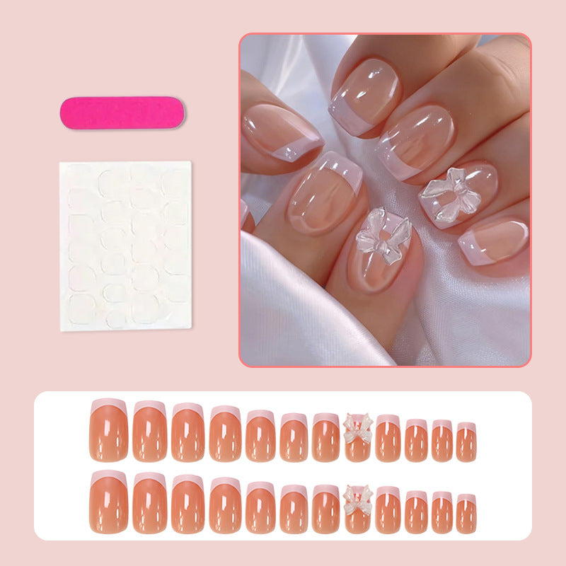 Artificial Nail Set with Romantic Bows and French Tip Stornfield