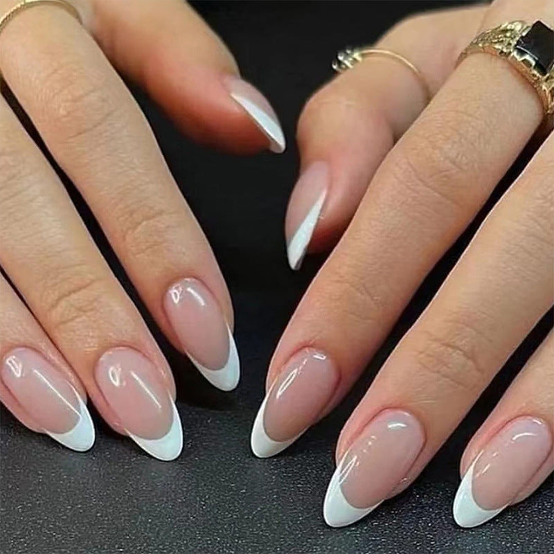 Artful stiletto nails with heart-shaped accents Stornfield