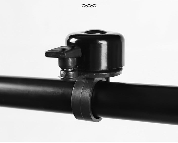 compact universal bicycle handlebar bell with quick-release mount Stornfield