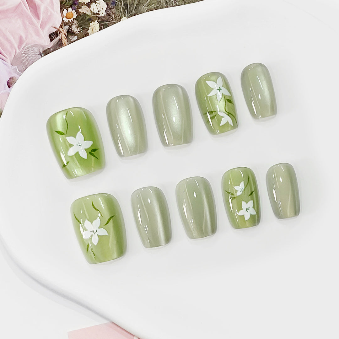 Artistic acrylic nails with floral design Stornfield