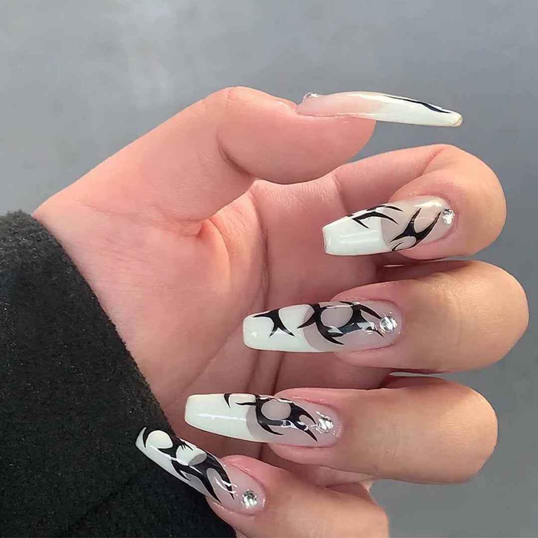 Elegant Artificial Nails with Decorative Black and Glitter Accents Stornfield