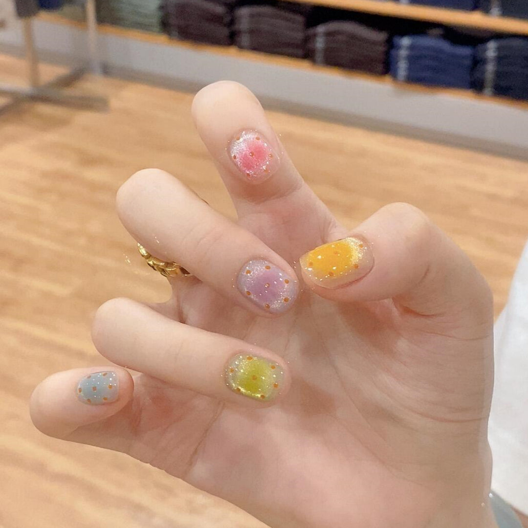 Glittering artificial nail tips in cheerful design Stornfield