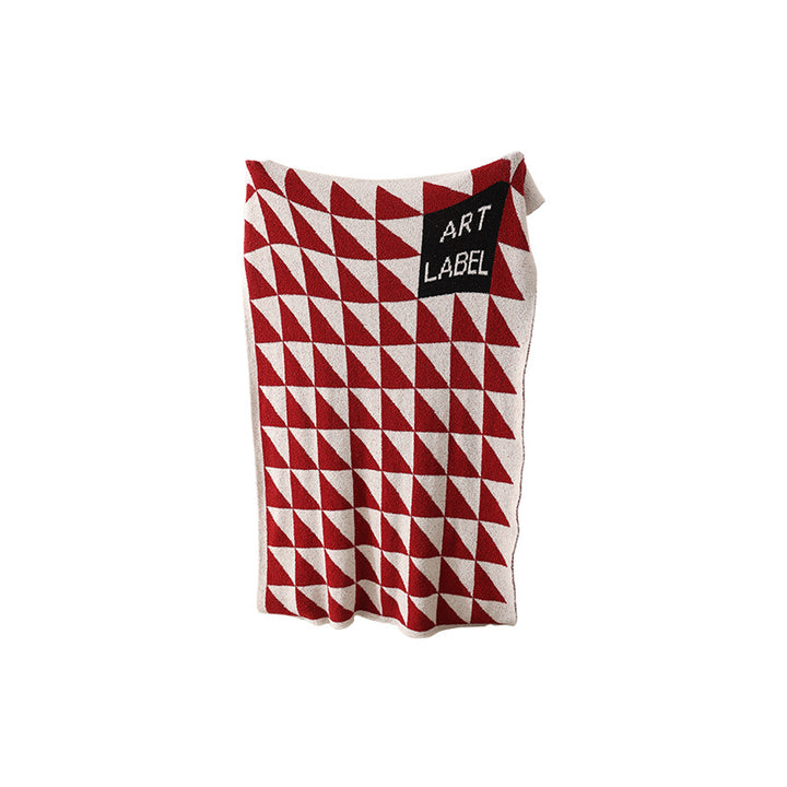 Coarsely woven decorative blanket with geometric jacquard pattern and soft bouclé Stornfield