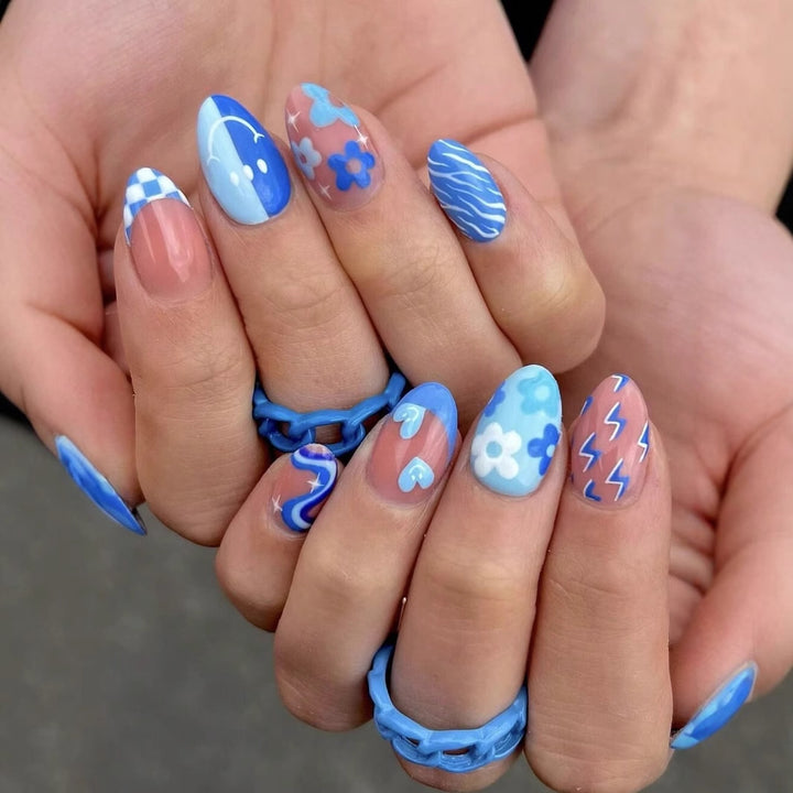 Artificial nail set with colorful flower pattern and creative accents Stornfield