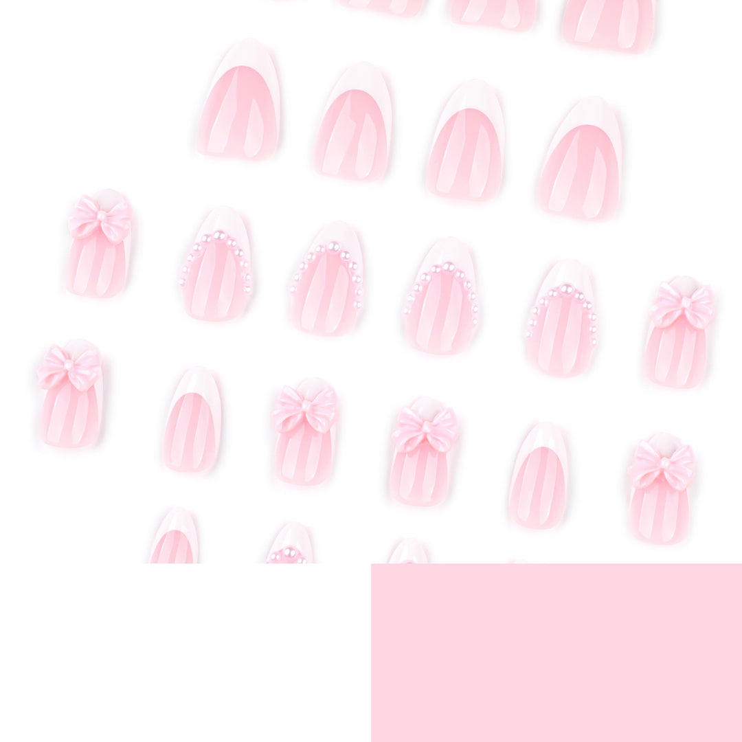 Artful Stiletto Nails with Delicate Bow Accents Stornfield