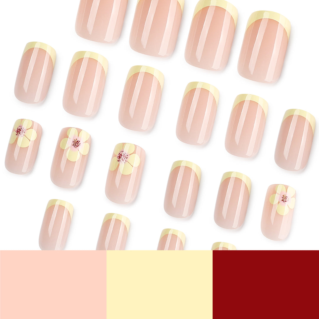 Artistic French-tip nails with floral decorations Stornfield