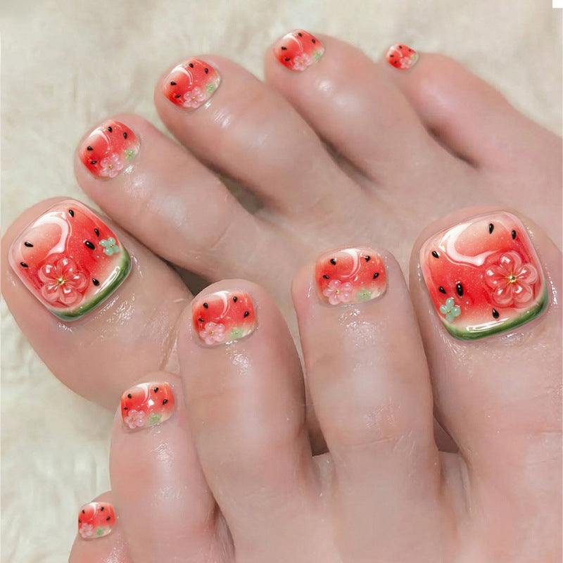 Creative nail art set with cheerful watermelon designs and delicate floral accents Stornfield