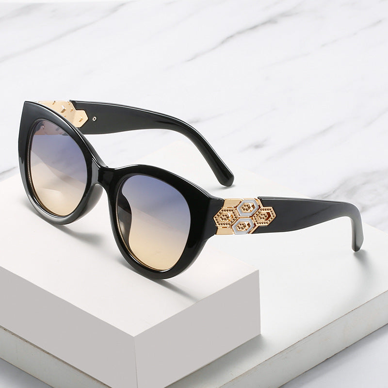 Fashion-Forward Cat-Eye Sunglasses with Decorative Accents Stornfield