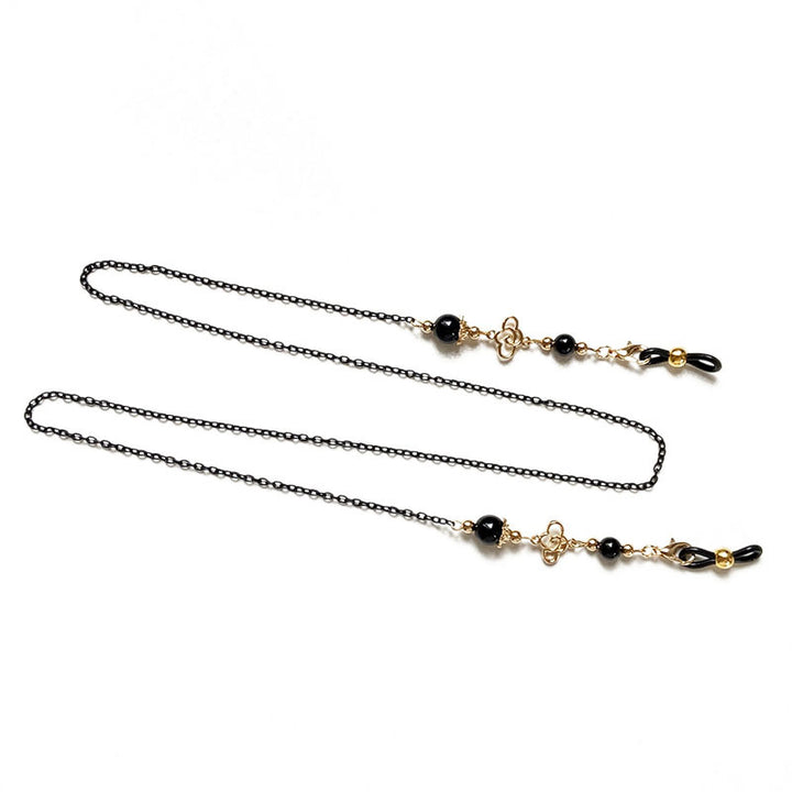 Filigree glasses chain holder with pearls and golden accents Stornfield