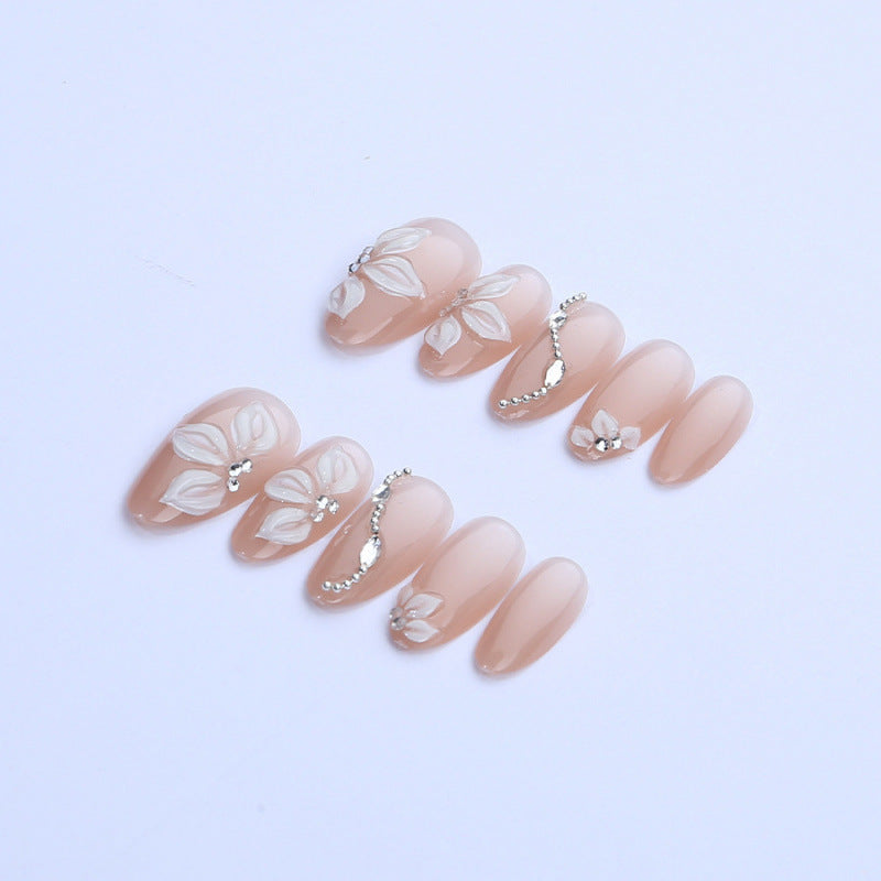 Elegant artificial nails with floral decorations Stornfield