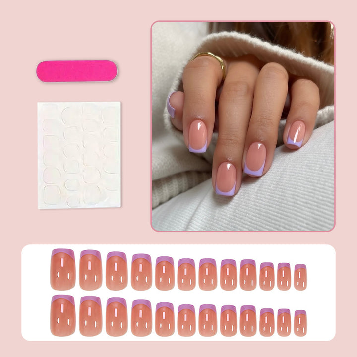 Artificial nail set with elegant French manicure style and romantic accents Stornfield
