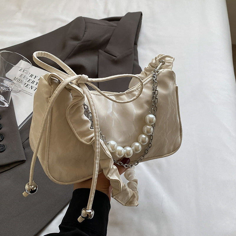 Elegant Pearl-Accented Handheld Bag