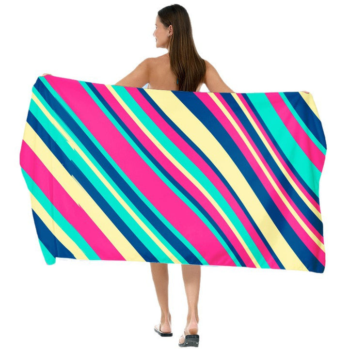 Beach towel with vibrant gradient color and stylish striped design Stornfield