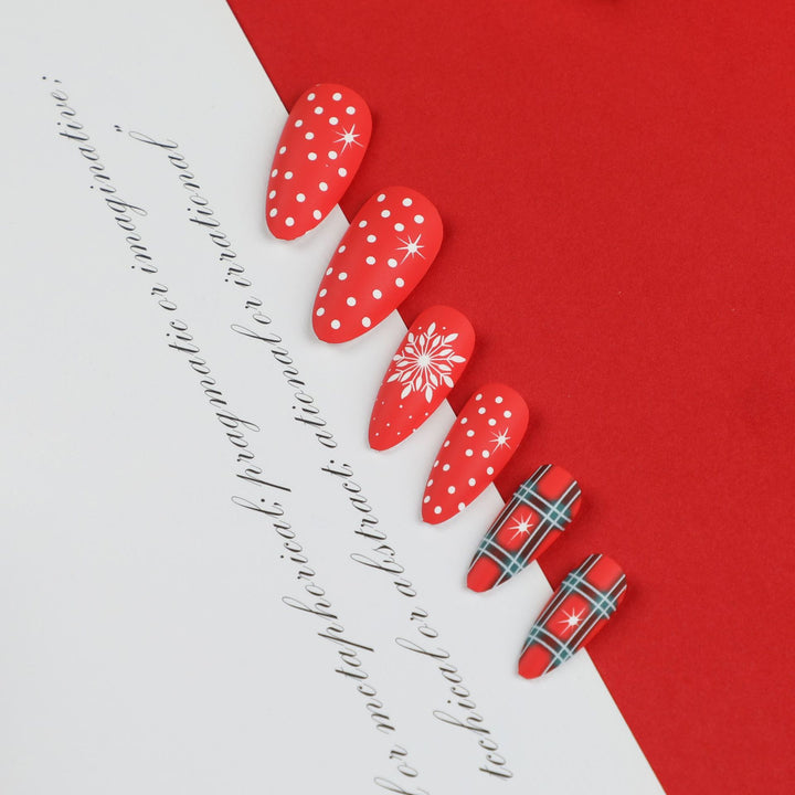 Artful stiletto nails with festive design Stornfield