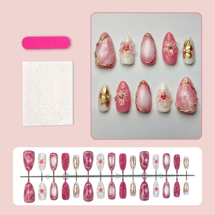 Acrylic nail set with floral accents and glitter details Stornfield