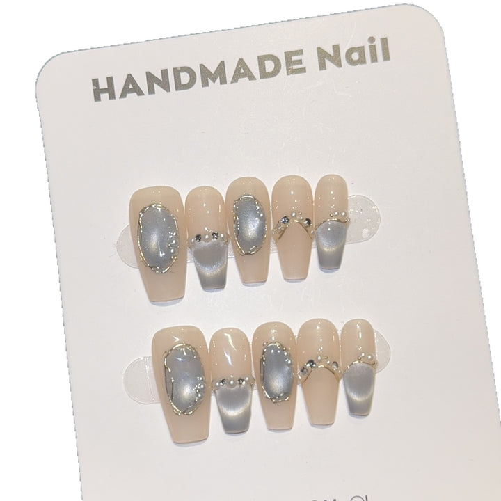 Elegant Nail Tips with Glitter Accents Stornfield