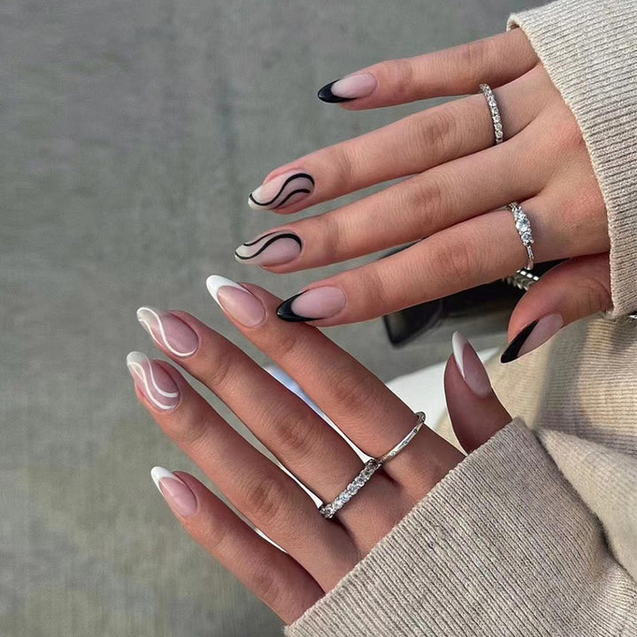 Elegant Artificial Nail Art with Curved Designs and Stornfield Accents