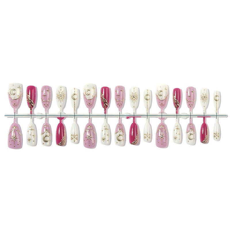 Artificial nail set with glamorous glitter and star accents Stornfield