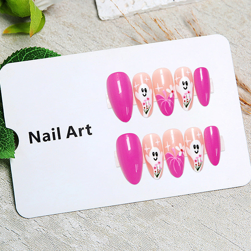 Creative nail tips with ghost design and flower motifs Stornfield