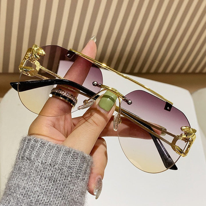 Women Designer Sunglasses with Unique Animal Accent Stornfield
