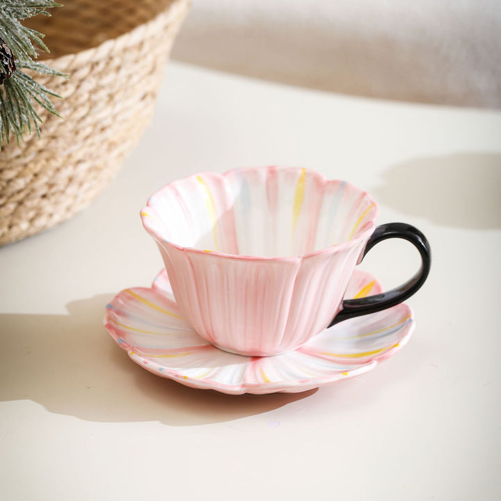 Handcrafted ceramic mug with shell-shaped wave edge and contrasting handle