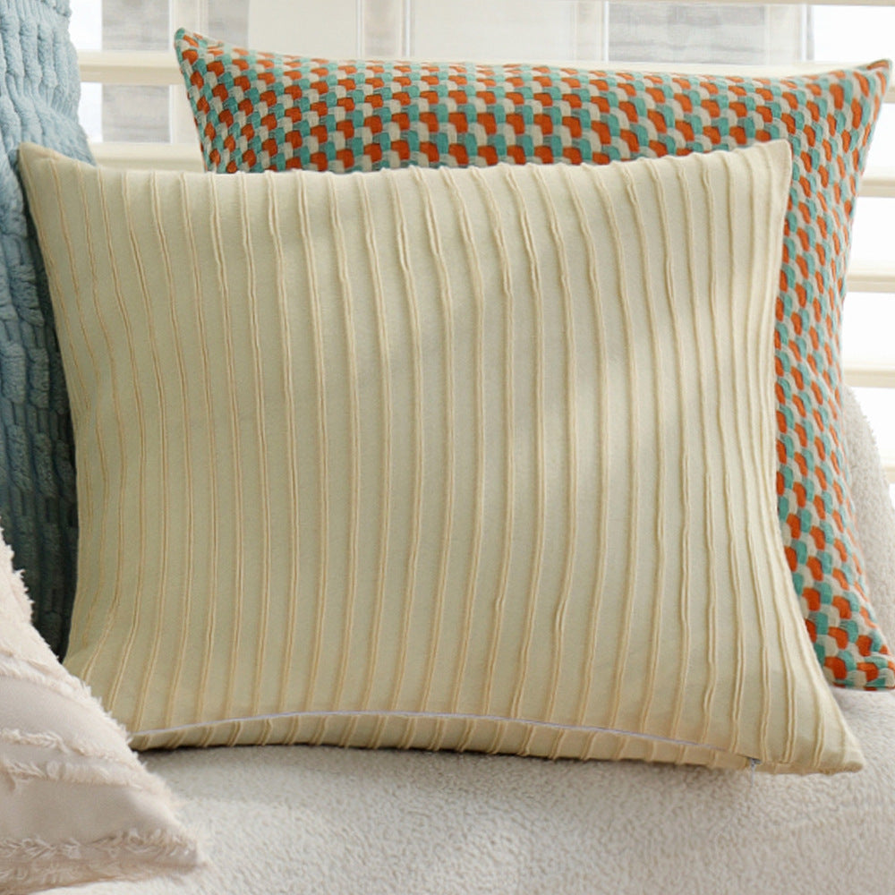 Long decorative pillows with structured surface